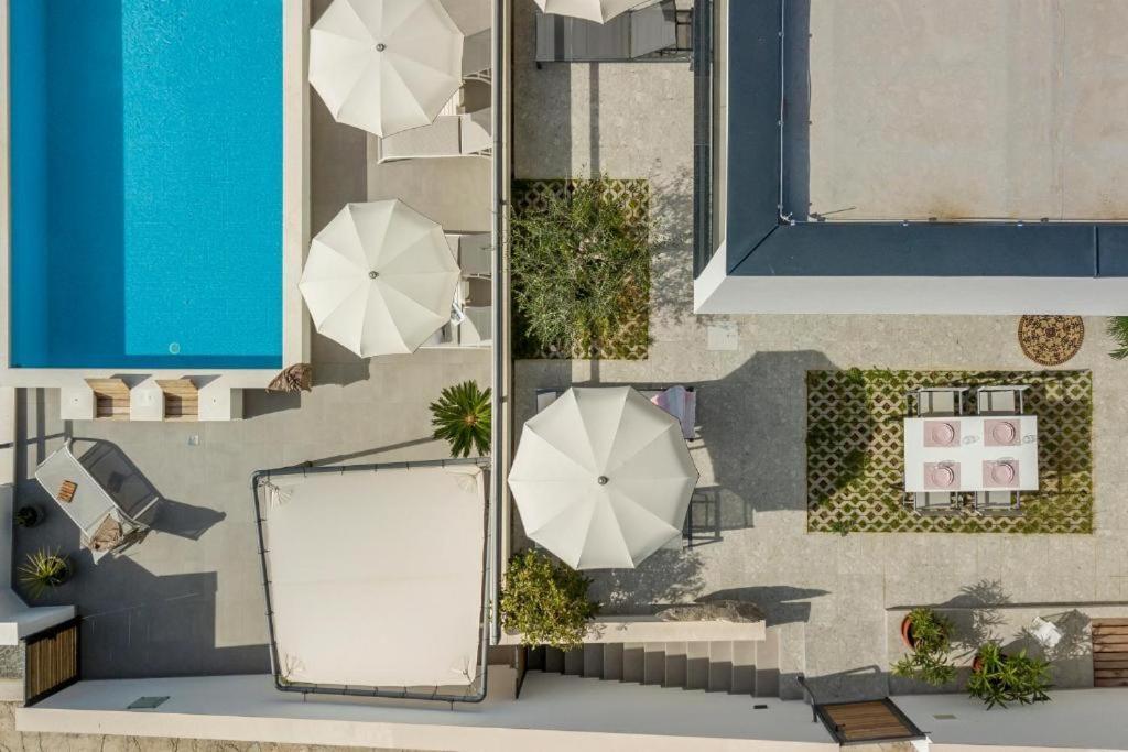 Holiday home Lolina,sea On A Palm! Heated Pool